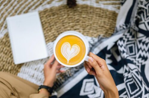 Self care morning, lady with coffee and notebook