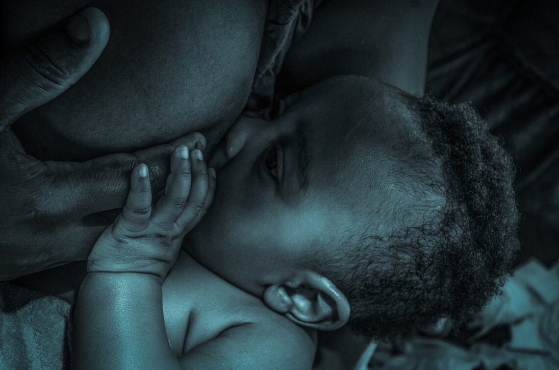 Women Breastfeeding baby